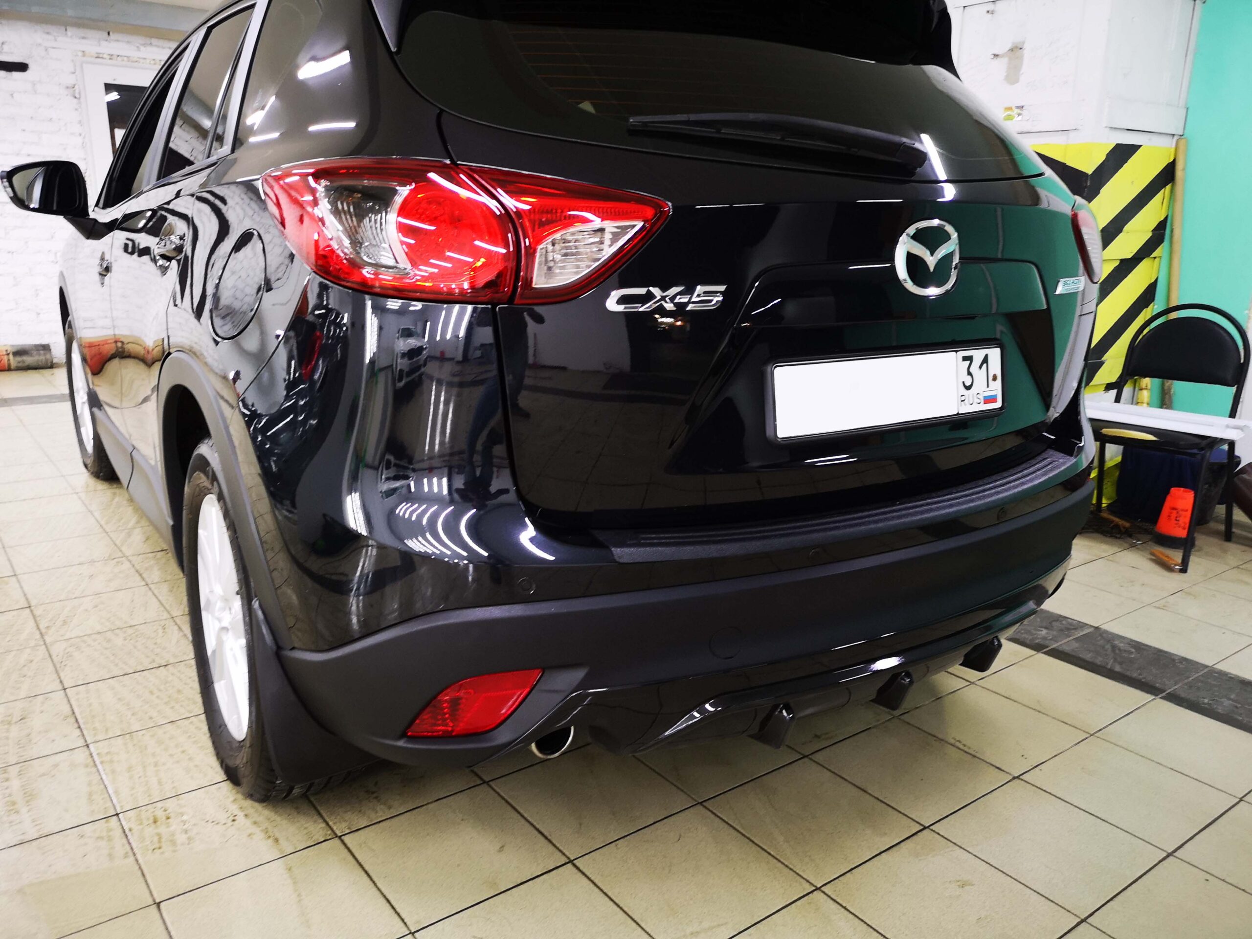 Диффузор заднего бампера Mazda CX-5 СТ под элероны (CT-CX5-D01)