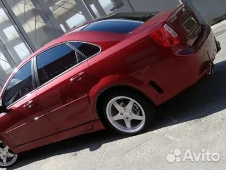 Задний бампер Chevrolet Lacetti седан RIGER (CT-CLC-RB01)